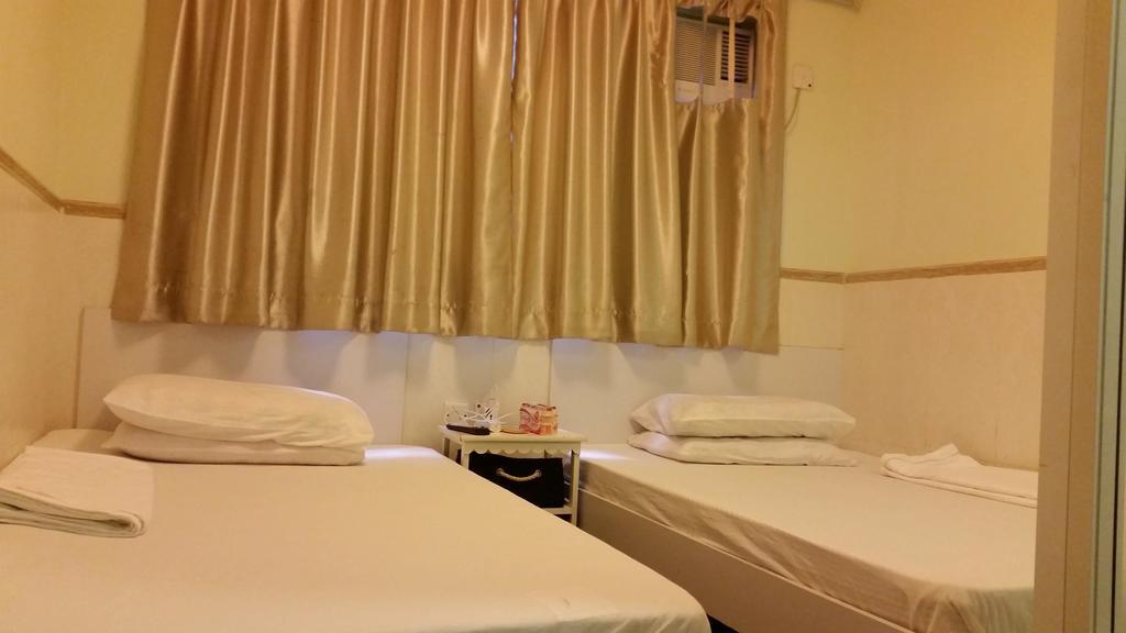 Li Cheng Guesthouse Hongkong Værelse billede